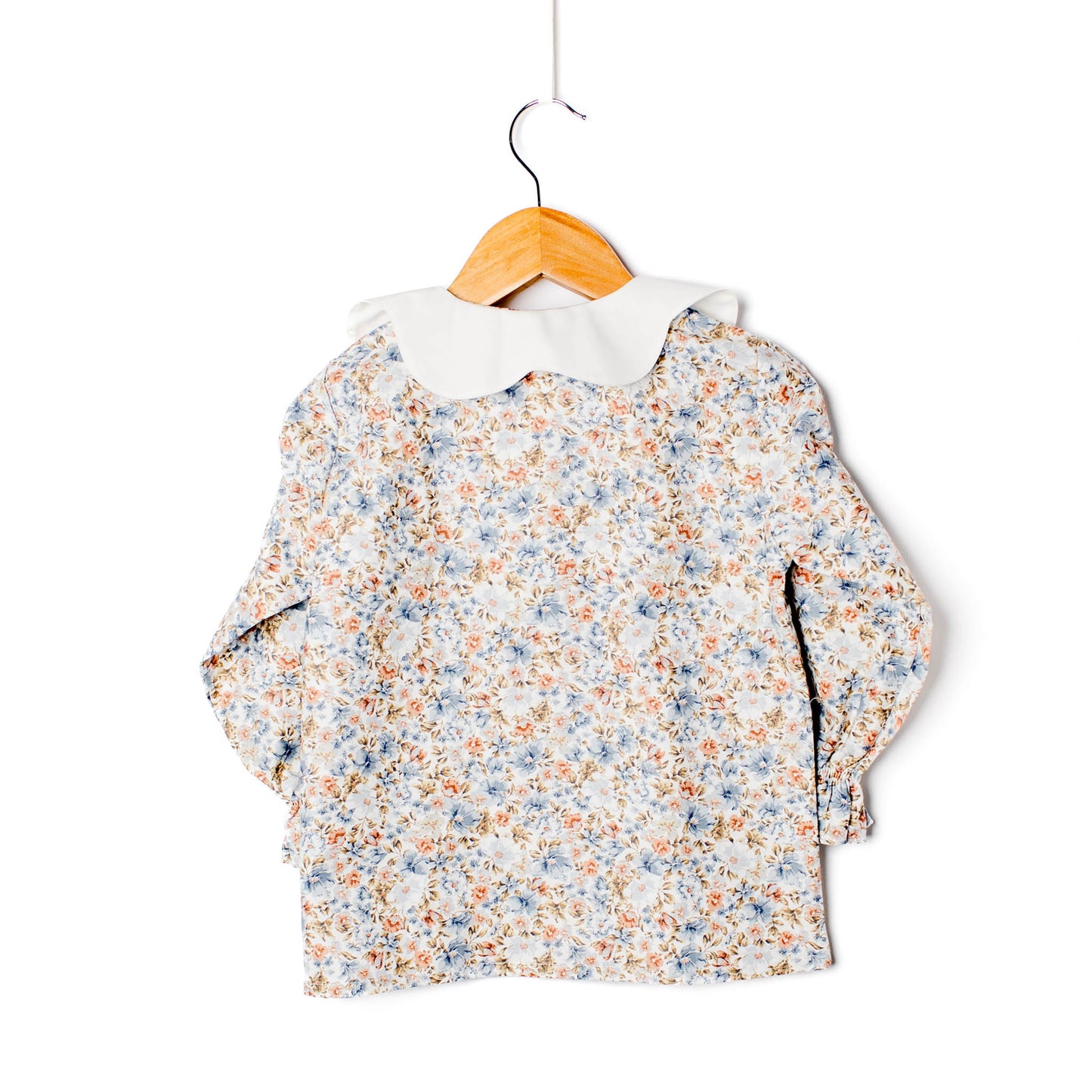 Blusa menina flores gola recortada