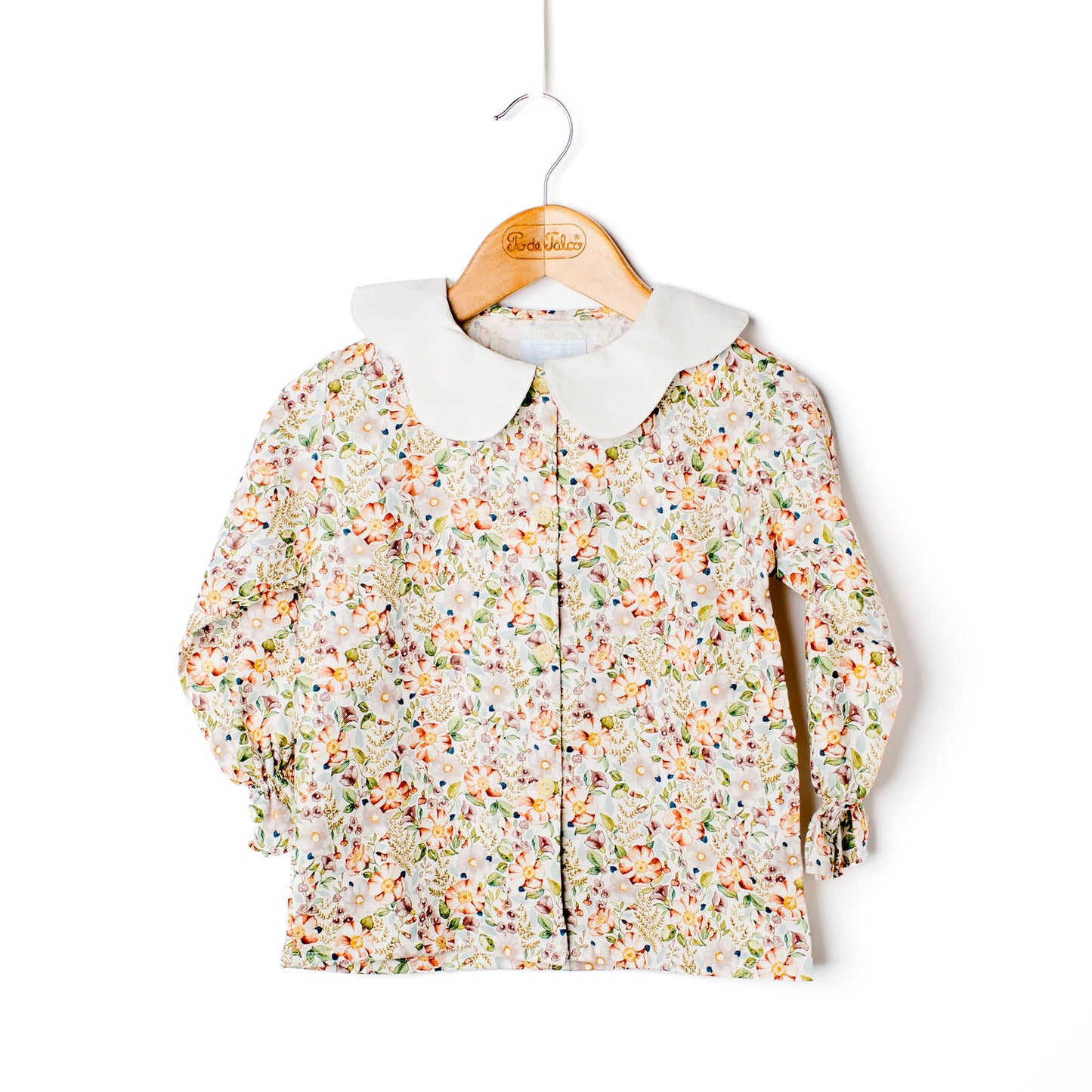 Blusa menina flores gola recortada